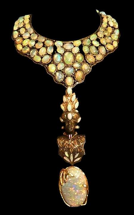 Gold sculptural jewellery piece